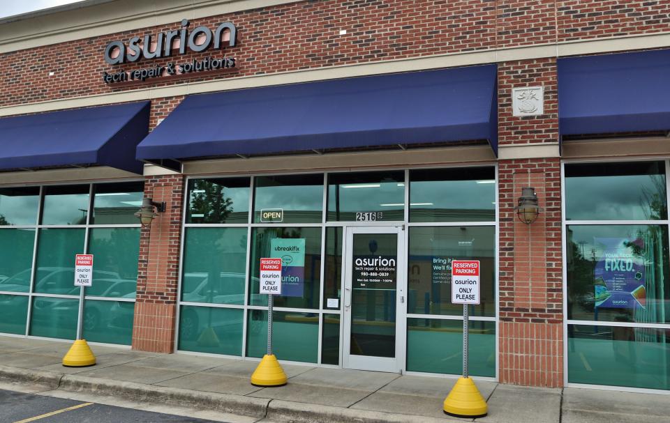 The exterior of asurion tech repair & solutions on East Franklin Boulevard Friday morning, May 13, 2022.