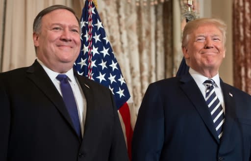 US Secretary of State Mike Pompeo (L) will unveil Donald Trump's new strategy on Iran on Monday in his first major foreign policy speech
