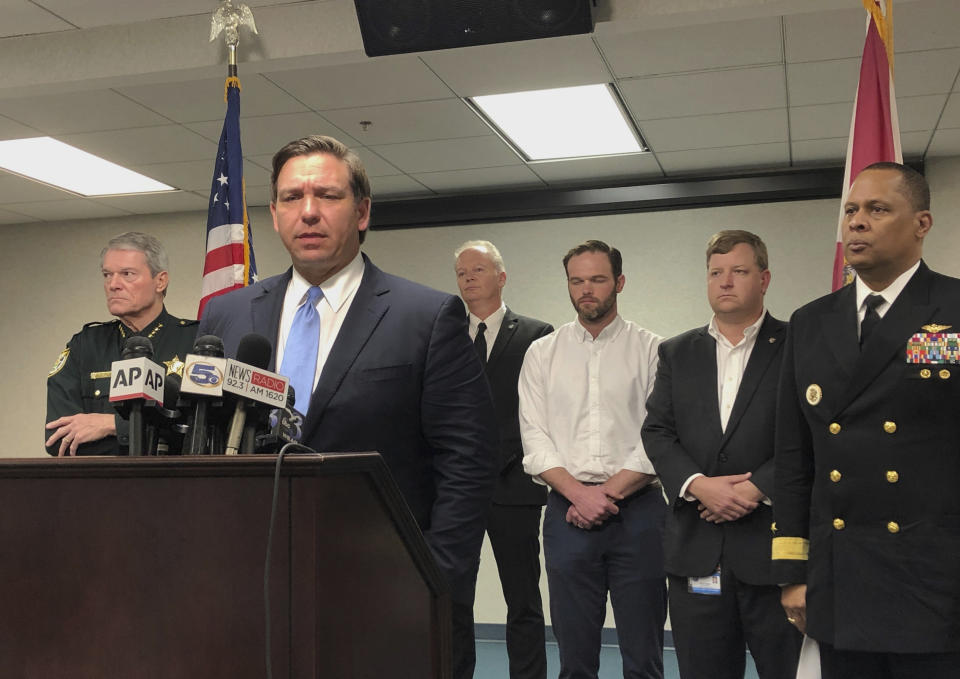 Florida Gov. Ron DeSantis speaks to the media after a visiting the scene where a Royal Saudi Air Force officer killed three American Navy sailors at Naval Air Station Pensacola. DeSantis was briefed on the shooting on Sunday, Dec. 8, 2019, in Pensacola, Florida. (Photo: Brendan Farrington/AP)  