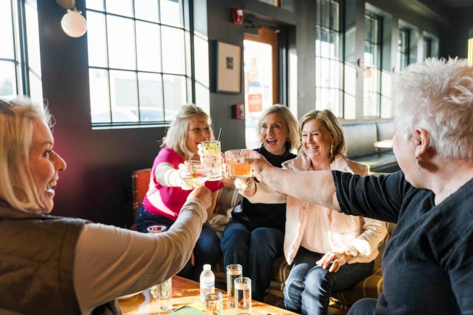 Guests enjoy a drink in the cocktail room at Longleaf Distillery Co. in downtown Macon.