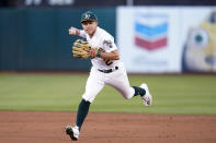 Oakland Athletics second baseman Nick Allen fields a groundout hit by Los Angeles Angels' Magneuris Sierra during the third inning of a baseball game in Oakland, Calif., Monday, Aug. 8, 2022. (AP Photo/Jeff Chiu)