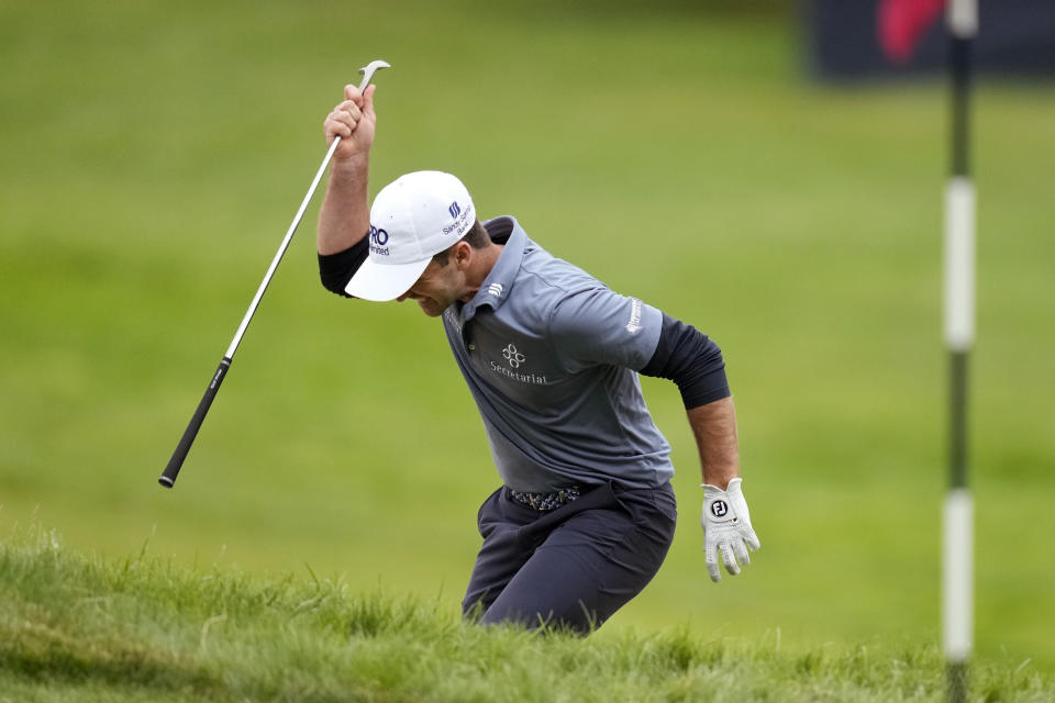 Denny McCarthy reacts after a shot on the 18th hole during the final round of the U.S. Open golf tournament at The Country Club, Sunday, June 19, 2022, in Brookline, Mass. (AP Photo/Charles Krupa)