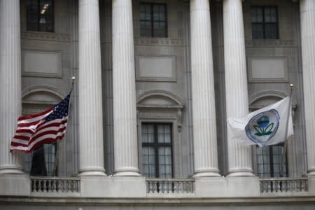 FILE PHOTO: Flags fly outside the U.S. Environmental Protection Agency (EPA) at EPA headquarters in Washington, U.S., July 11, 2018. REUTERS/Ting Shen