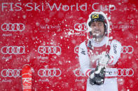 Skiing - Men's Alpine Ski World Cup Slalom - Val d´Isere, France - December 10, 2017 Austria's Marcel Hirscher celebrates on the podium after winning the Men's Alpine Ski World Cup Slalom REUTERS/Christian Hartmann