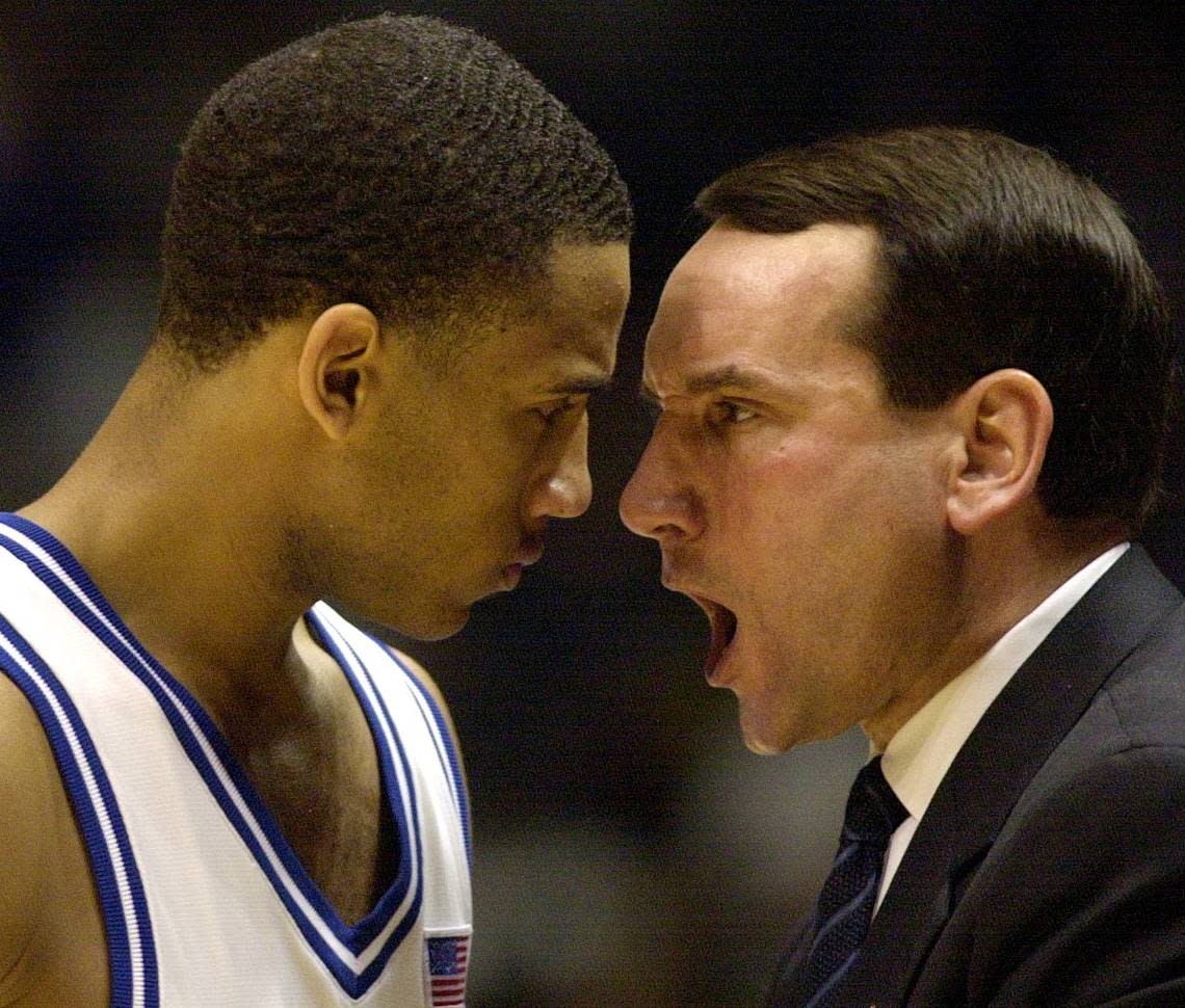 Coach Mike Krzyzewski lets Dahntay Jones he’s not pleased with a last second foul against Kentucky in the last .3 seconds of the overtime where Jones fouled out of the game. Jones scored the clinching basket and the Blue Devils won 95-92.