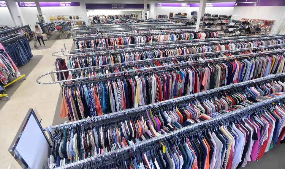 Racks of clothing await customers Thursday at the AMVETS Thrift Store in Erie.