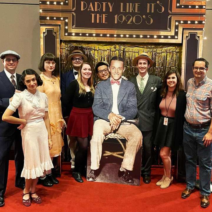 Bix Beiderbecke fans gather with a cutout of the legendary Davenport native at the annual jazz fest in his honor at Davenport’s Rhythm City Casino Event Center.