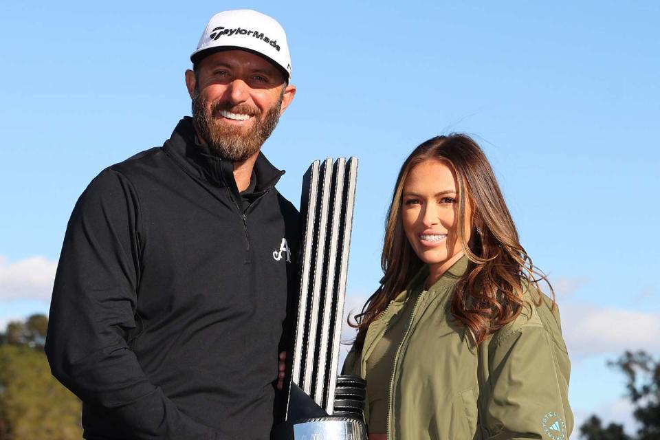 <p>Michael Reaves/Getty</p> Dustin Johnson and Paulina Gretzky in February 2024