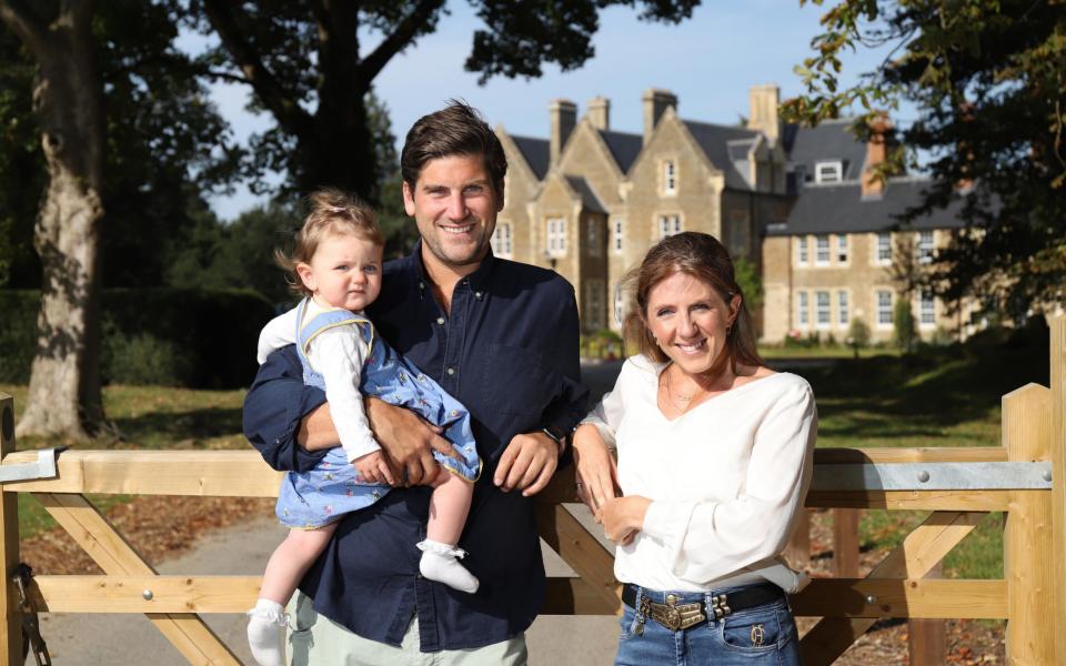 Harry and Natasha Banks, with their daughter Olive, left London to buy their first home at the Parklands Manor development near Oxford - John Lawrence for The Telegraph