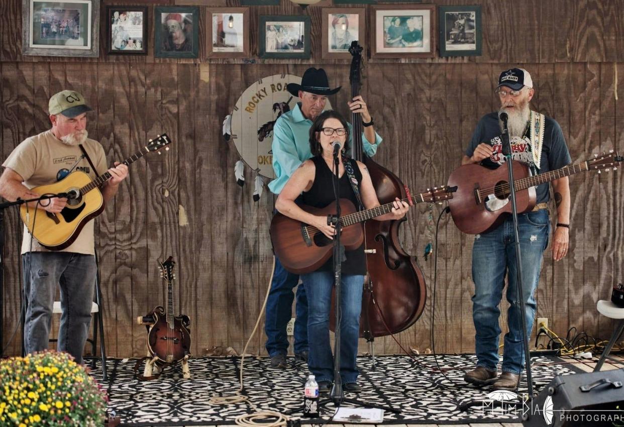 Members of Gypsy Twang, from left, are Kurt Neilsen, Sarah Barker Huhn, Steve Huhn and John Williams.