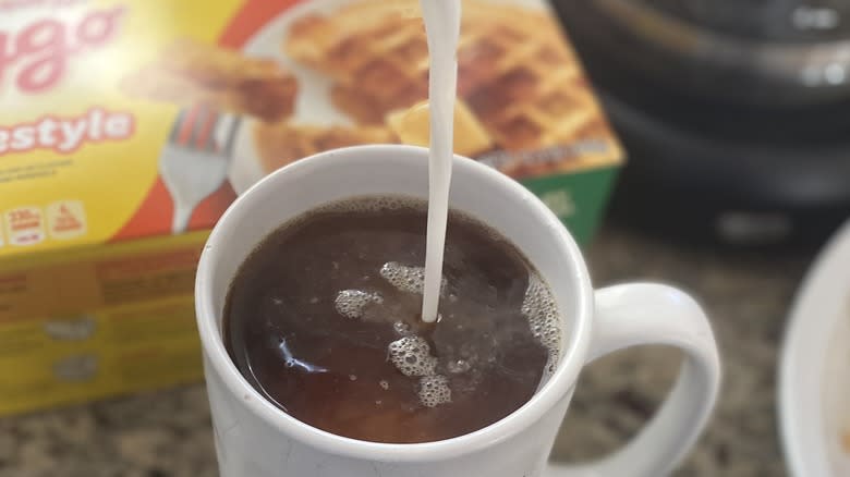 Eggo creamer pouring into coffee