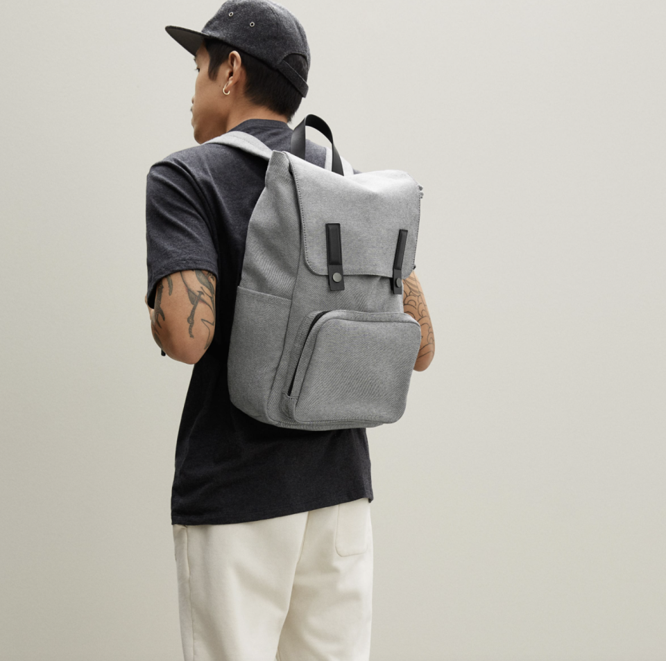 The Modern Snap Backpack in Reverse Denim + Black Leather (Photo via Everlane)