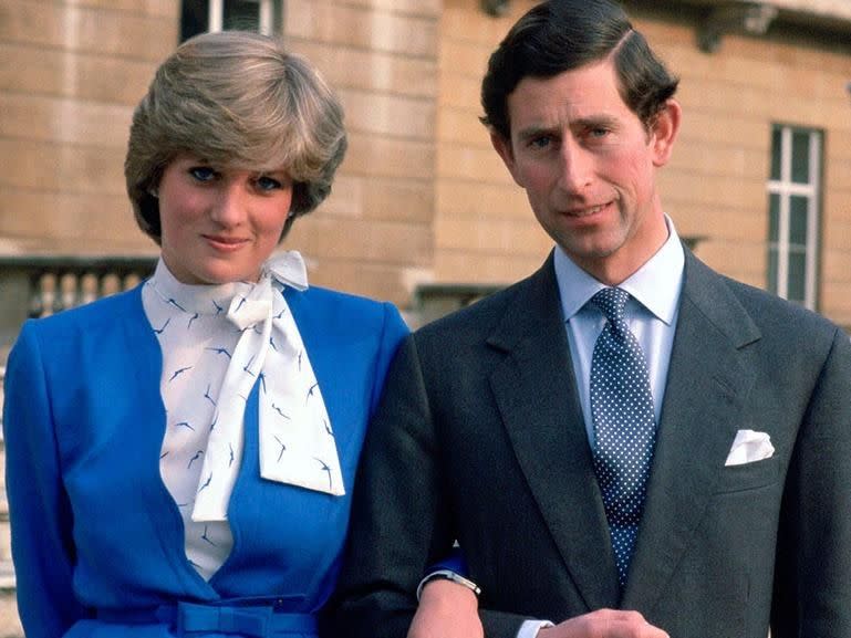 Not exactly brimming with joy... Diana and Charles at their engagement announcement. Source: Getty