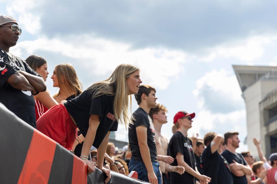 A fan reacts during the fourth quarter of the NCAA football game between the Cincinnati Bearcats and the Miami RedHawks at Paycor Stadium in Cincinnati on Saturday, Sept. 17, 2022. The Cincinnati Bearcats defeated the Miami (Oh) Redhawks 38-17 in the 126th Battle for the Victory Bell. 