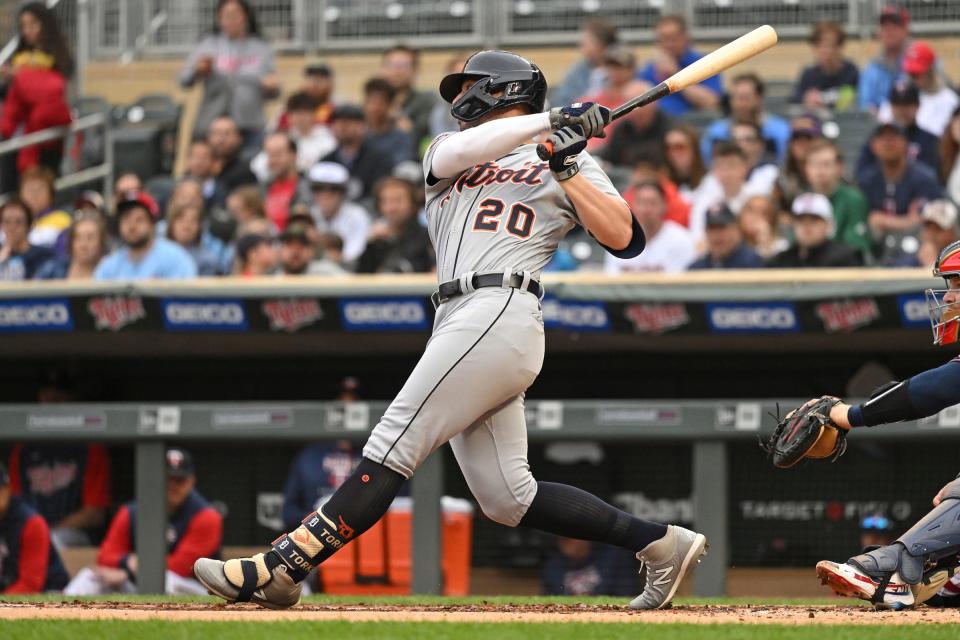 Detroit Tigers first base Spencer Torkelson (20) hits a single against the Minnesota Twins during the second inning at Target Field.