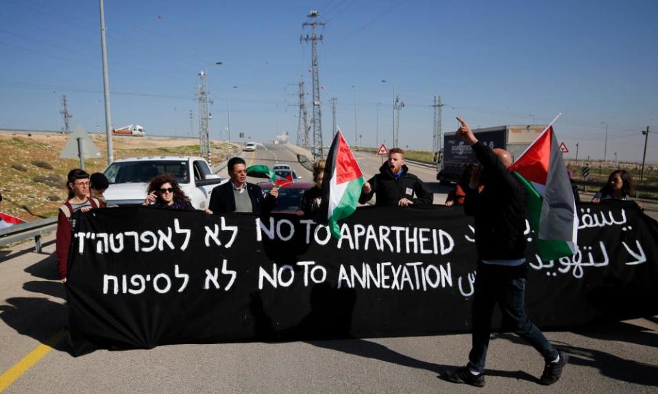 Palestinian, Israeli and foreign protesters take part in a demonstration against the newly opened Route 4370 on Wednesday.