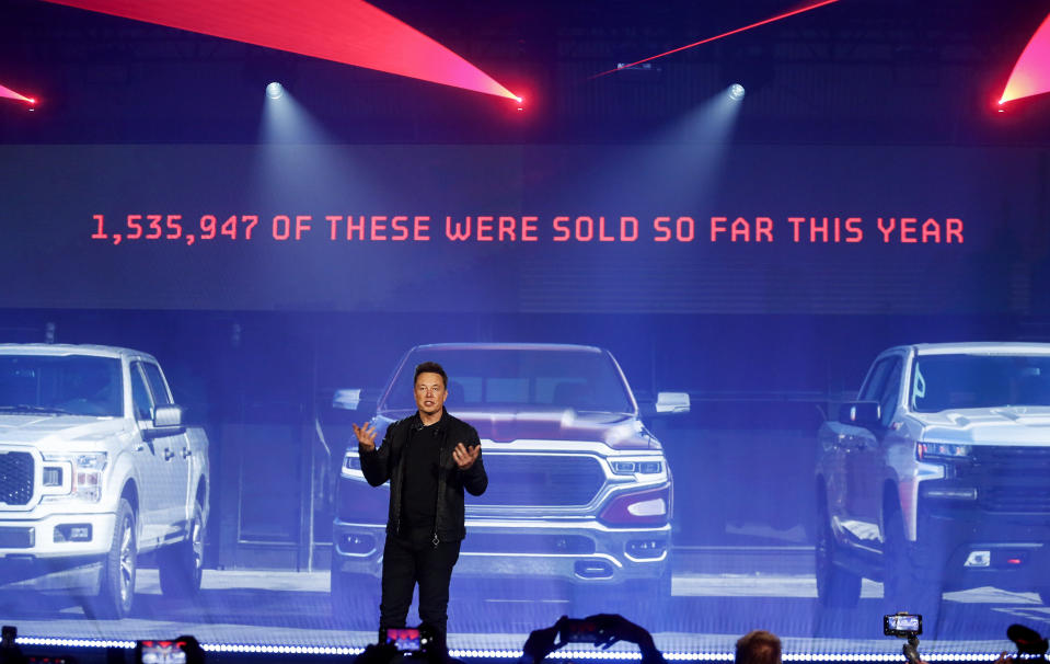 Tesla CEO Elon Musk introduces the Cybertruck at Tesla's design studio Thursday, Nov. 21, 2019, in Hawthorne, Calif. Musk is taking on the workhorse heavy pickup truck market with his latest electric vehicle. (AP Photo/Ringo H.W. Chiu)