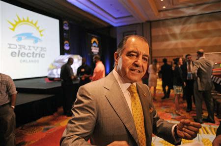 Seifi Ghasemi, Chairman of the Electrification Coalition, talks after the announcement of the Drive Electric Orlando program at the Peabody Orlando Hotel in Orlando, Florida September 5, 2013. The initiative is promoting electric car rentals starting with 15 cars available to rent with 26 partner hotels with charging stations while area theme parks have committed to building charging stations. REUTERS/David Manning