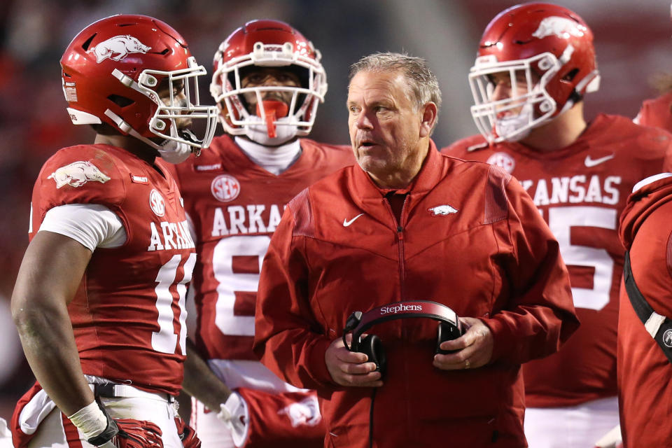 Nov 26, 2021; Fayetteville, Arkansas; Arkansas Razorbacks head coach Sam Pittman talks to wide receiver Treylon Burks (16) during a timeout in the second half against the Missouri Tigers at Donald W. Reynolds Razorbacks Stadium. Arkansas won 34-17. Nelson Chenault-USA TODAY Sports