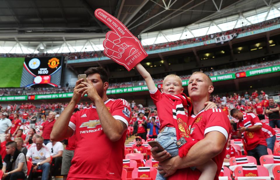 Football Soccer Britain - Leicester City v Manchester United - FA Community Shield - Wembley Stadium - 7/8/16 Manchester United fans before the match Reuters / Eddie Keogh Livepic EDITORIAL USE ONLY. No use with unauthorized audio, video, data, fixture lists, club/league logos or "live" services. Online in-match use limited to 45 images, no video emulation. No use in betting, games or single club/league/player publications. Please contact your account representative for further details.