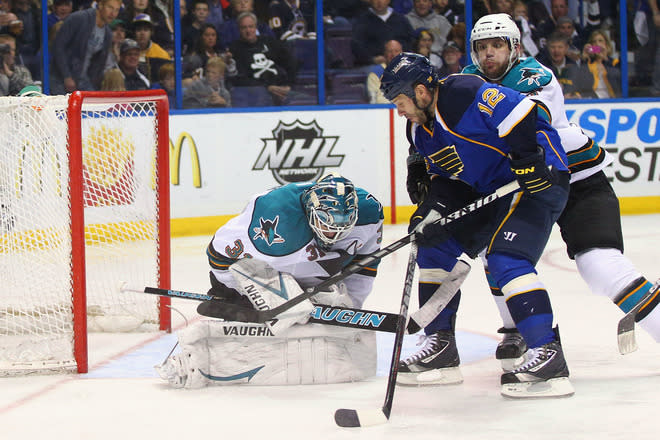  Antti Niemi #31 Of The San Jose Sharks Makes A Save Against Scott Nichol #12 Of The St. Louis Blues As Tommy Wingels # Getty Images