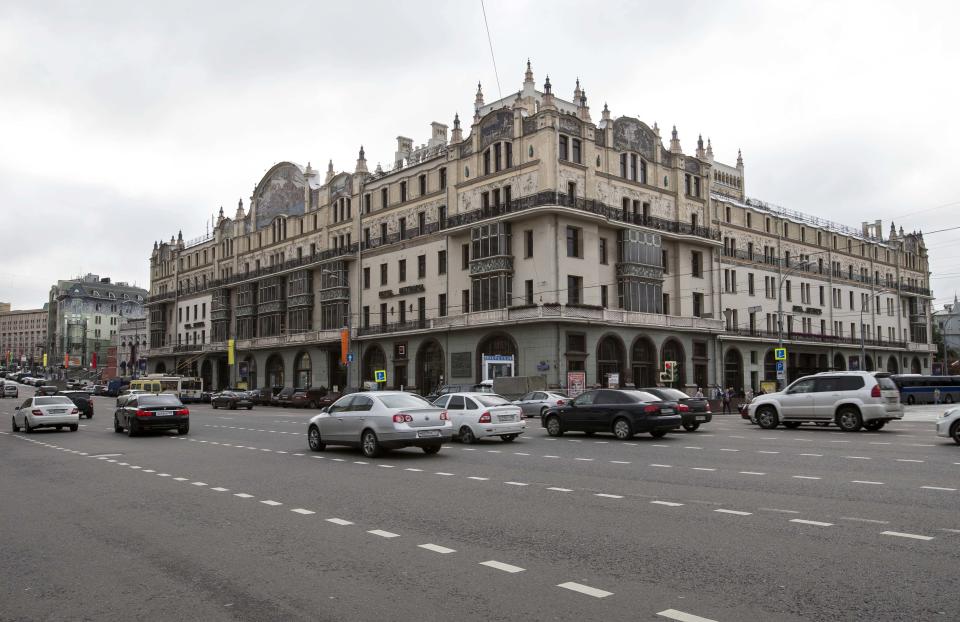 Cars drive past Moscow's Metropol Hotel on Thursday, Aug. 30, 2012. Michael Jackson slept there. Vladimir Lenin harangued Bolsheviks there. Over the past century, the Hotel Metropol has seen the extremes of Russian life, from austere revolutionary fervor to flashy pop indulgence. Now, at a starting price of 8.7 billion rubles ($272 million), the hotel is up for sale Thursday, auctioned off by the Moscow city government as part of its privatization program. (AP Photo/Alexander Zemlianichenko)