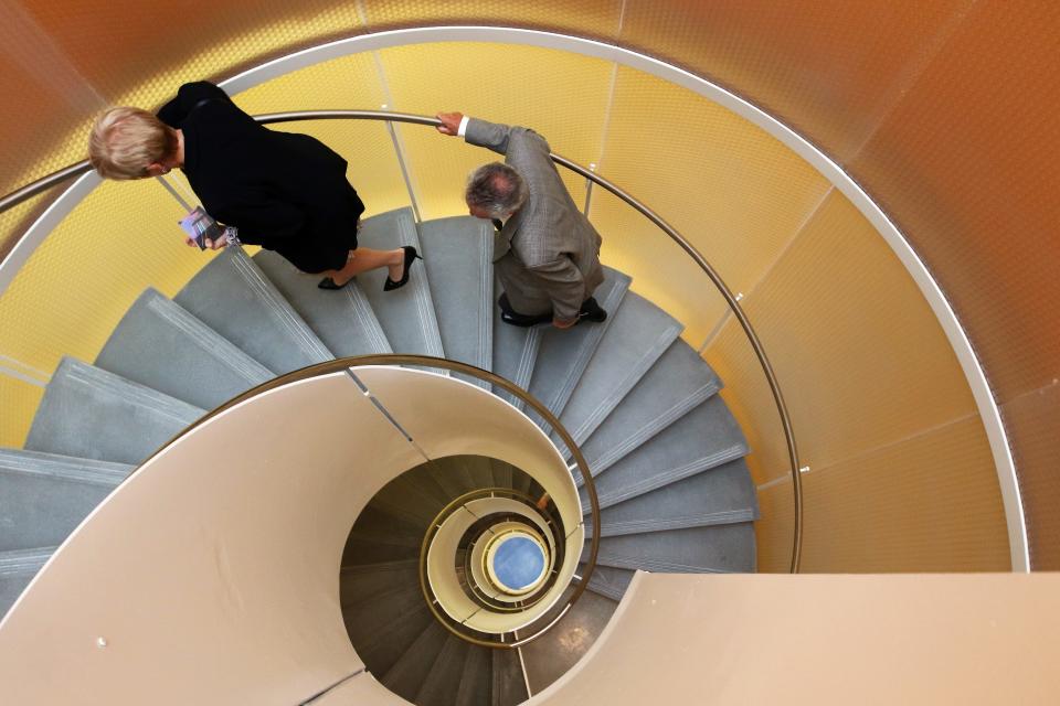 The spiral staircase at URI's Fascitelli Center for Advanced Engineering. Of the top 100 top-earning state employees in 2022, six work at URI; of the top 25 earners, 15 work at the school.