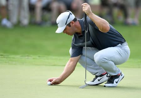 Sep 23, 2017; Atlanta, GA, USA; Paul Casey lines up his ball on the first green during the third round of the Tour Championship golf tournament at East Lake Golf Club. Mandatory Credit: John David Mercer-USA TODAY Sports