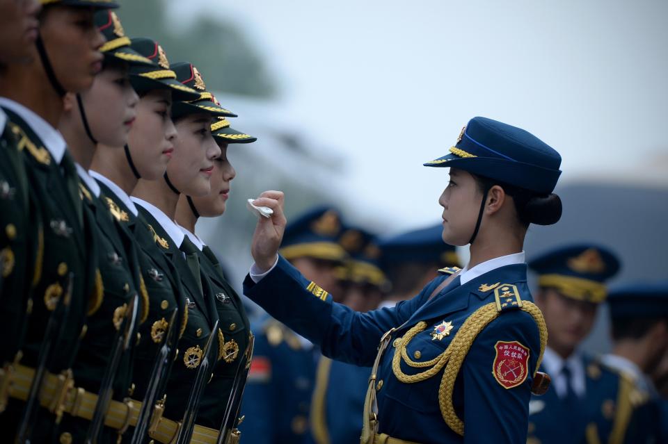 Chinese honor guards prepare for the arrival of <a href="http://news.xinhuanet.com/english/2015-07/21/c_134433597.htm">New Zealand Governor-General Jerry Mateparae</a> at a welcome ceremony outside the Great Hall of the People in Beijing on July 21.