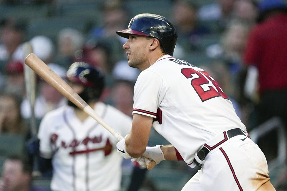 Atlanta Braves' Matt Olson (28) watches his solo home run in the fifth inning of a baseball game against the Los Angeles Angels, Monday, July 31, 2023, in Atlanta. (AP Photo/John Bazemore)