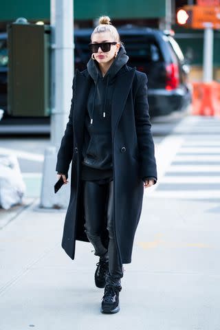 12 Outfits That Revolve Around a Pair of Black Pants