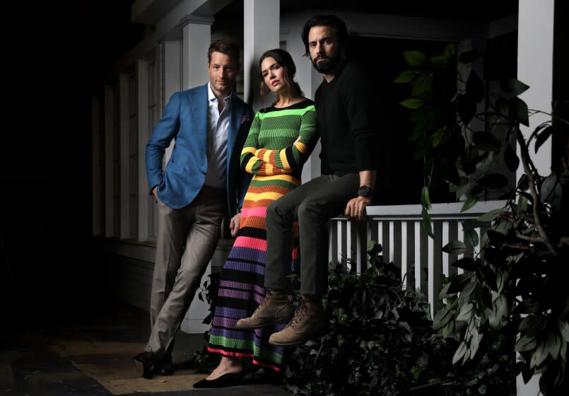 Justin Hartley, Mandy Moore, and Milo Ventimiglia, from left, of "This Is Us" are photographed at the Paramount Lot