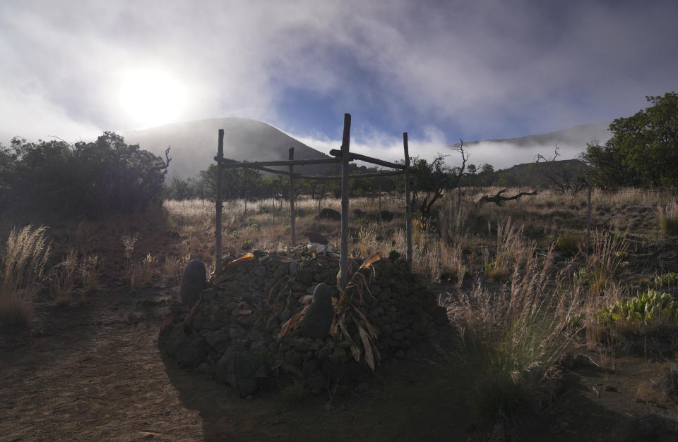 A ceremonial platform used by Native Hawaiian cultural practitioners called an "ahu," at 9,000 feet elevation on Mauna Kea in Hawaii on Saturday July, 15, 2023. Along the slopes of this sacred mountain are ceremonial platforms, ancestral burial sites, and an alpine lake whose waters are believed to have healing properties. (AP Photo/Jessie Wardarski)