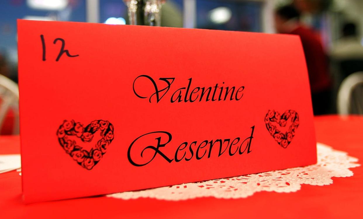 <span class="caption">While Valentine's Day is typically a night to celebrate, it might be best to order takeout this year because of the pandemic.</span> <span class="attribution"><a class="link " href="https://www.gettyimages.com/detail/news-photo/table-reservation-is-seen-inside-a-white-castle-restaurant-news-photo/56850564?adppopup=true" rel="nofollow noopener" target="_blank" data-ylk="slk:Tim Boyle/Getty Images;elm:context_link;itc:0;sec:content-canvas">Tim Boyle/Getty Images</a></span>