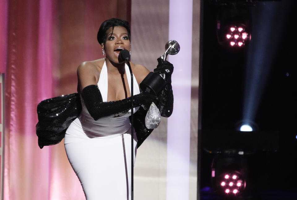 Fantasia Barrino, a cast member in "The Color Purple," accepts the award for Outstanding Actress in a Motion Picture during the 55th NAACP Image Awards, Saturday, March 16, 2024, at The Shrine Auditorium in Los Angeles. (AP Photo/Chris Pizzello)