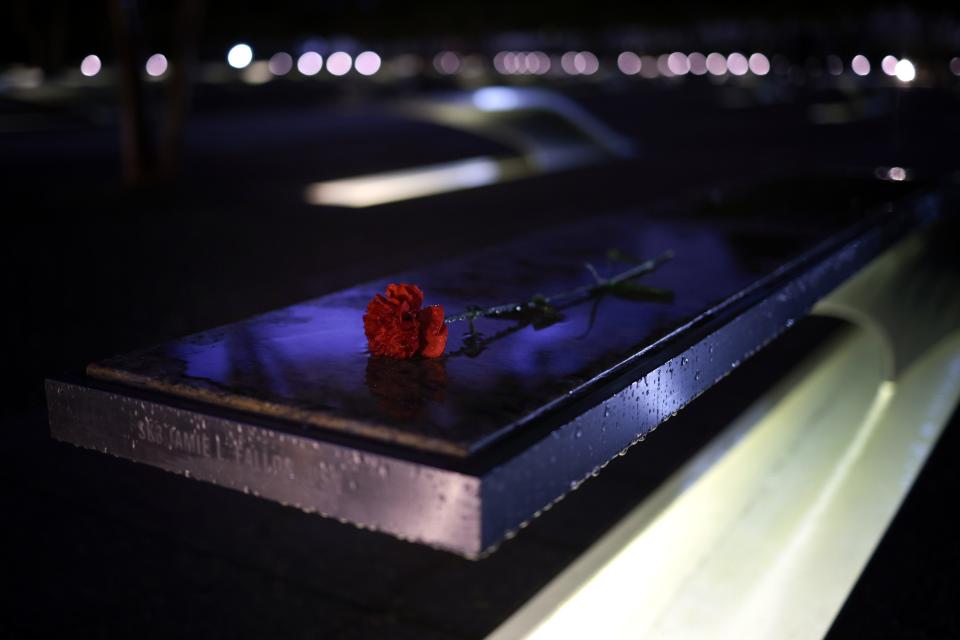 A rose is placed on a bench at the National 9/11 Pentagon Memorial during a ceremony observing the 9/11 terrorist attacks at the Pentagon on Sept. 11, 2023 in Arlington, Va. The Defense Department held a remembrance ceremony for the 184 lives lost in the 2001 terrorist attack on the Pentagon. Today marks the 22nd anniversary of Sept. 11, 2001 terrorist attacks at the World Trade Center, the Pentagon and Shanksville, Penn.