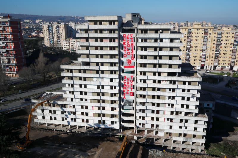 One of the so-called "Sails of Scampia", a tower block known as a stronghold of Naples mafia, is demolished