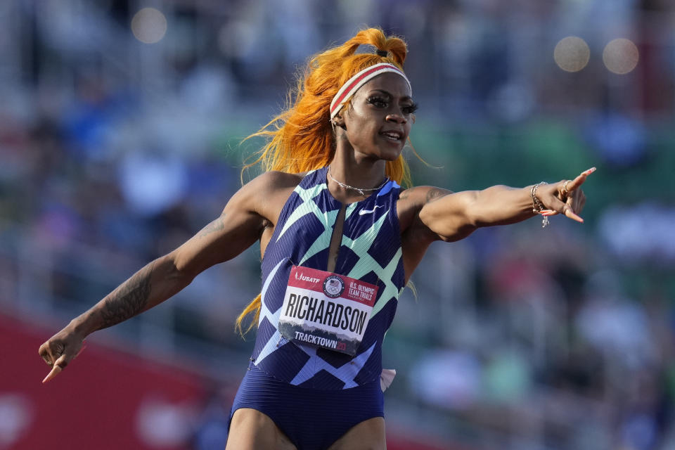 Sha'Carri Richardson celebrates after winning the first heat of the semis finals in women's 100-meter runat the U.S. Olympic Track and Field Trials Saturday, June 19, 2021, in Eugene, Ore. (AP Photo/Ashley Landis)