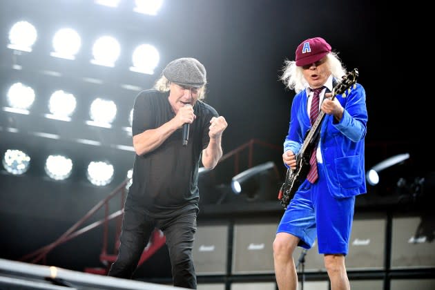 Brian Johnson and Angus Young of AC/DC perform at Wembley Stadium in London in July. - Credit: Jim Dyson/Getty Images