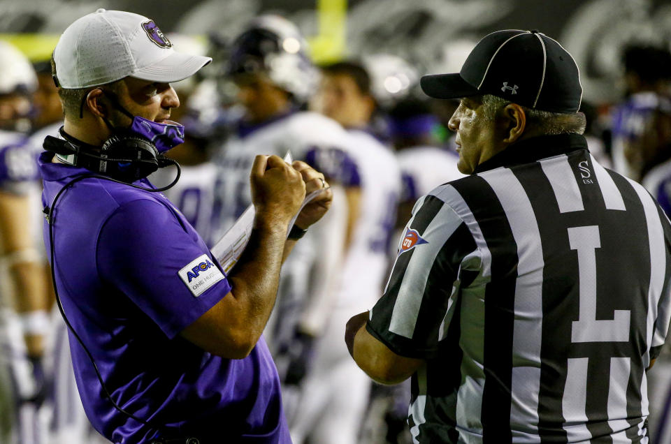 MONTGOMERY, ALABAMA - AUGUST 29: Head coach Nathan Brown of Central Arkansas talks with a referee about a call during the second half of the Guardian Credit Union FCS Kickoff football game against Austin Peay on August 29, 2020 in Montgomery, Alabama. (Photo by Butch Dill/Getty Images)