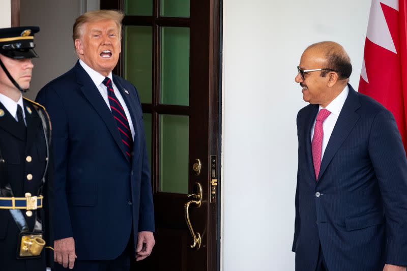 U.S. President Donald Trump welcomes Bahrain's Foreign Minister Abdullatif bin Rashid Al Zayani at the White House