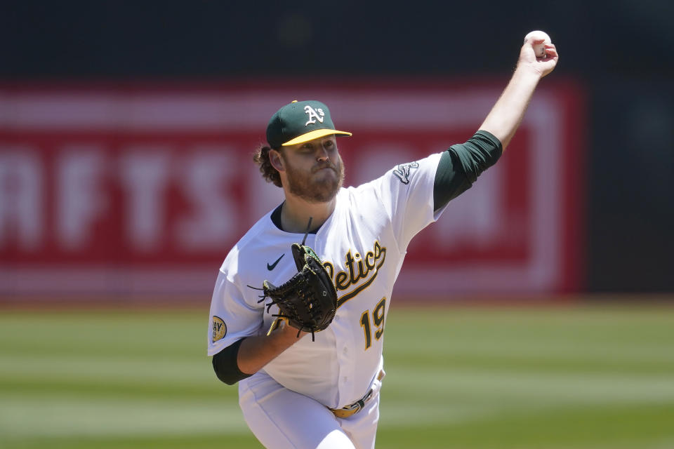 Oakland Athletics' Cole Irvin pitches against the Kansas City Royals during the first inning of a baseball game in Oakland, Calif., Saturday, June 18, 2022. (AP Photo/Jeff Chiu)