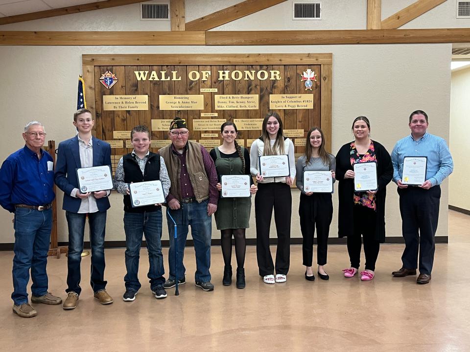 From left, John Luig (Post 2676 Auxiliary President), Jackson Davidson (First Place PP, Holliday Middle School), James Romero (3d Place PP, Windthorst Jr. High), Bert Hoff (VFW Post 2676 Commander), Sadie Bassham (First Place VOD, Bassham Academy), Annikah Frank (2d Place VOD, Windthorst High School), Emma McKnight (3d Place VOD, Holliday High School), Paige Oliver (Teacher of the Year, Holliday Middle School) and Darrin Ard (Teacher of the Year, Holliday High School). Not pictured: Parker Marchand (2d Place PP, Holliday MIddle School).