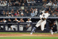 New York Yankees' Juan Soto hits a pitch in the sixth inning of a baseball game against the Miami Marlins, Tuesday, April 9, 2024, in New York. (AP Photo/Peter K. Afriyie)