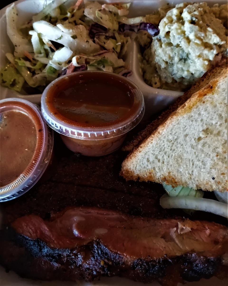 Zeke's rib plate with coleslaw and potato salad.