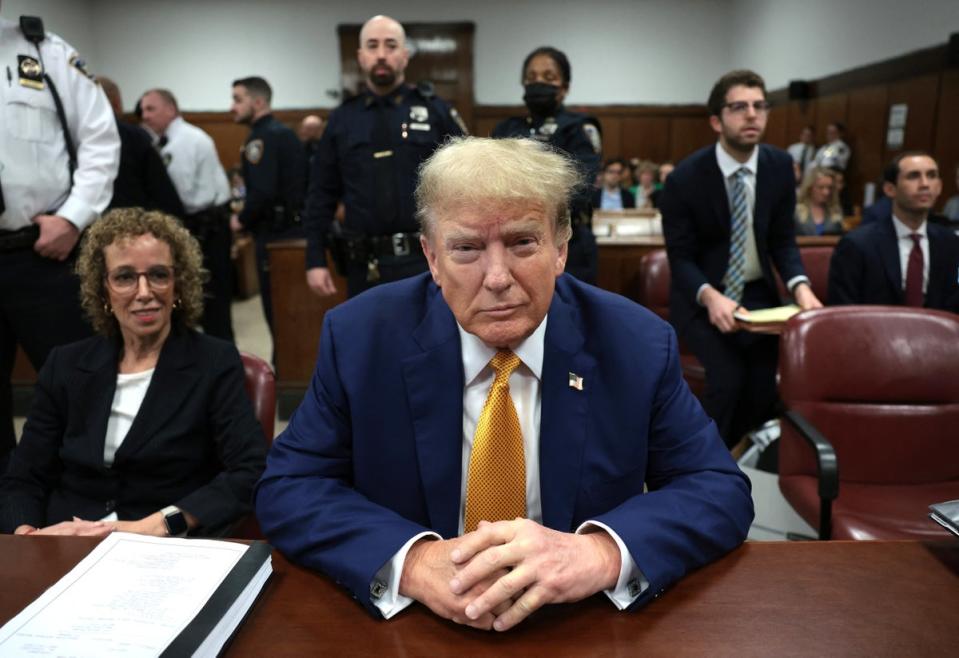 Former US President Donald Trump attends his trial for allegedly covering up hush money payments linked to extramarital affairs, at Manhattan Criminal Court in New York City, on May 7, 2024 (POOL/AFP via Getty Images)