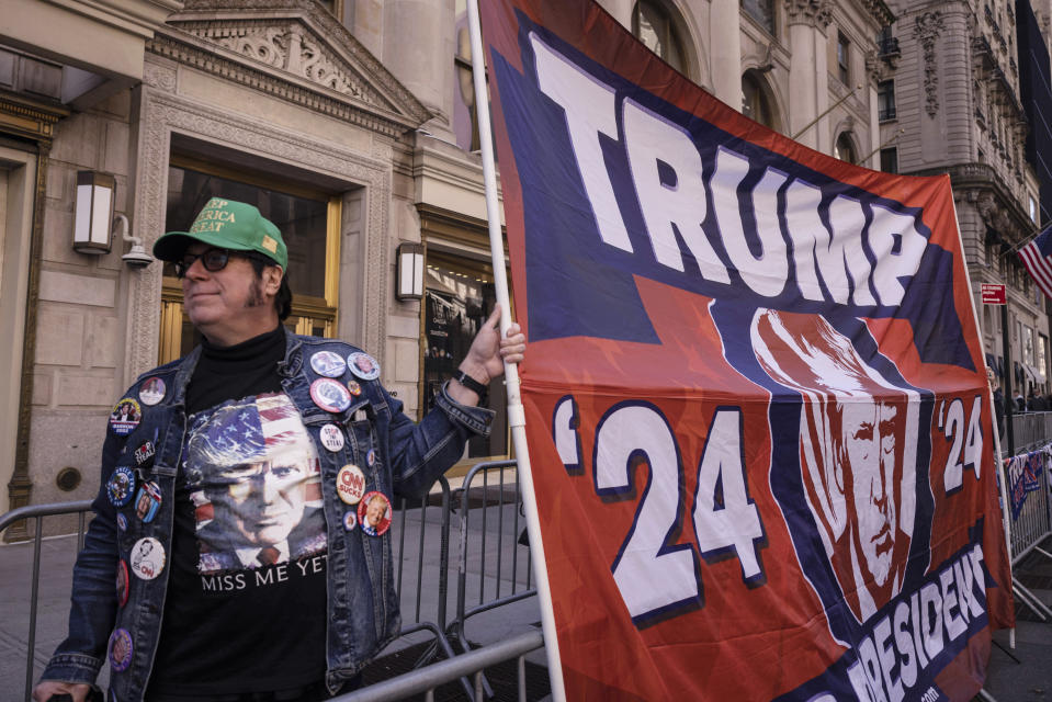 Supporters of former President Donald Trump protest outside Trump Tower in New York, Monday, April 3, 2023. (AP Photo/Yuki Iwamura)