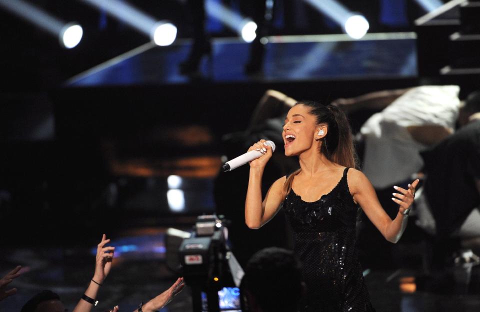 Ariana Grande performs at the iHeartRadio Music Awards at the Shrine Auditorium on Thursday, May 1, 2014, in Los Angeles. (Photo by Chris Pizzello/Invision/AP)