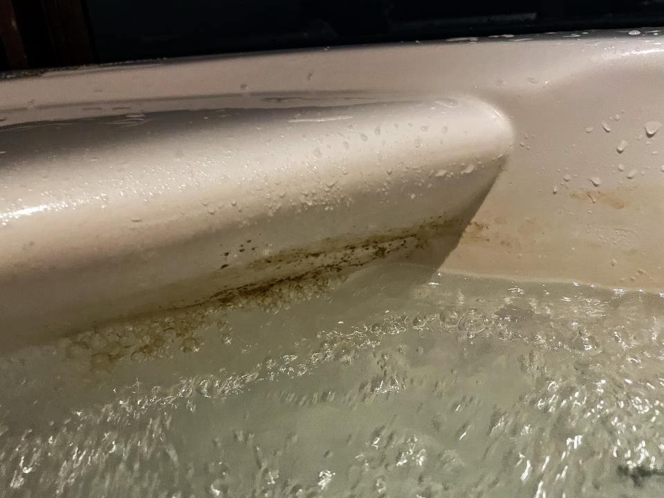 Grime from the Jacuzzi pipes.