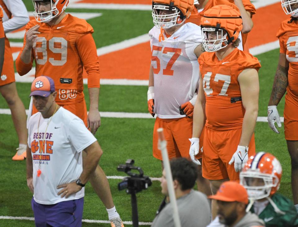 Clemson linebacker Sammy Brown (47) watches practice near Head Coach Dabo Swinney during Spring practice at the Poe Indoor Practice Facility at the Allen N. Reeves football complex in Clemson S.C. Friday, March 1, 2024.